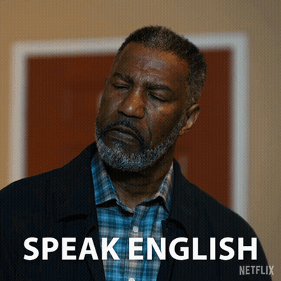 A Man With His Eyes Closed And The Words Speak English Written Below Him GIF