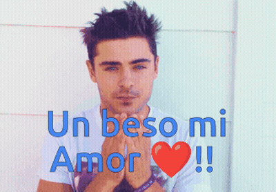 A Man With His Eyes Closed And The Words " Un Beso Mi Amor " On The Bottom GIF