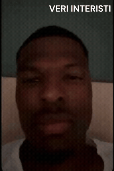 A Man With His Eyes Closed And The Words Veri Interisti On The Bottom Right GIF
