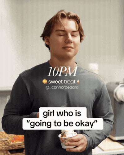 A Man With His Eyes Closed Holding A Cup Of Ice Cream With The Time Of 10Pm GIF