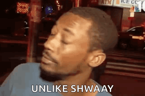 A Man With His Eyes Closed Is Making A Funny Face And Saying Unlike Shwaay GIF
