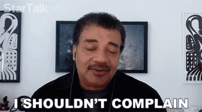 A Man With His Eyes Closed Is Saying I Should N't Complain . GIF
