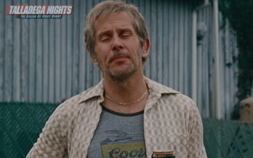 A Man With His Eyes Closed Is Wearing A Shirt That Says Coors GIF