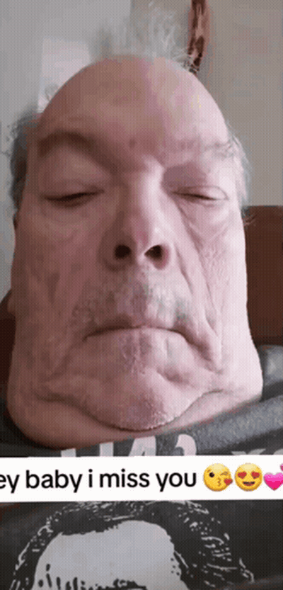 A Man With His Eyes Closed Is Wearing A Shirt That Says ' I Miss You ' On It GIF