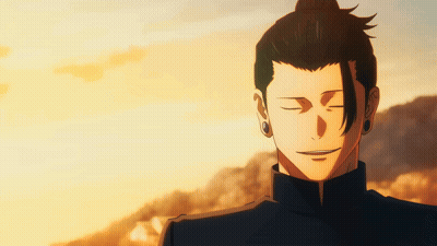 A Man With His Eyes Closed Is Wearing Earrings And A Ponytail GIF