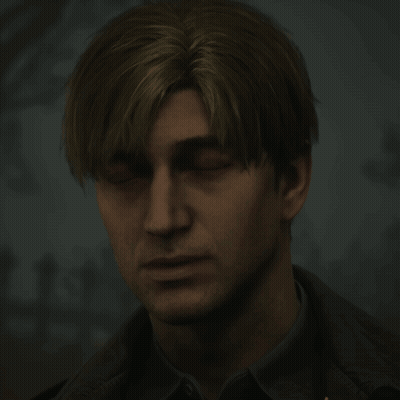 A Man With His Eyes Closed Looks Down At Something GIF