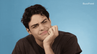 A Man With His Hand On His Chin And Buzzfeed Written On The Bottom GIF