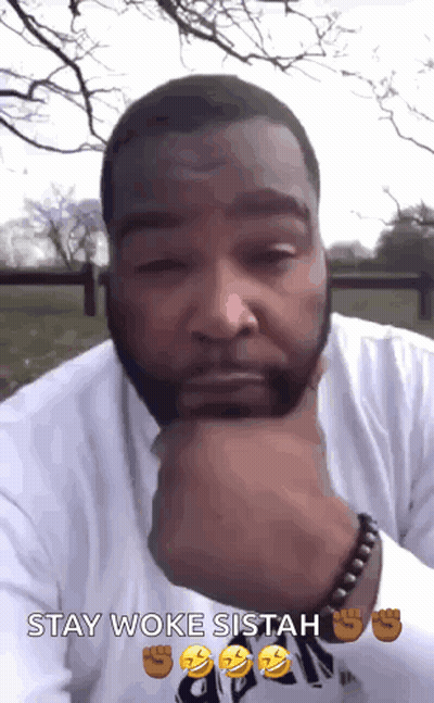 A Man With His Hand On His Chin And The Words Stay Woke Sitah GIF