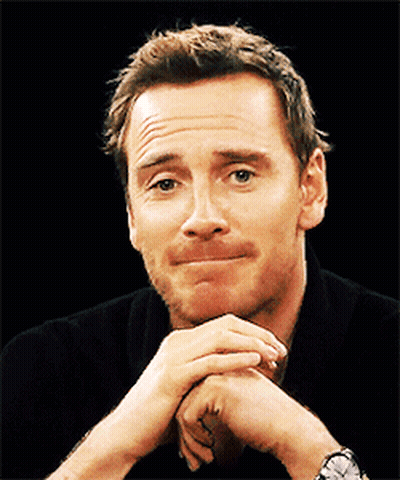 A Man With His Hands Folded Making A Face GIF