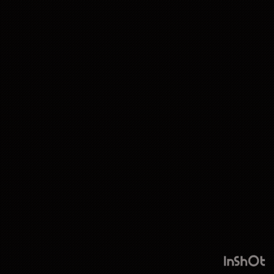 A Man With His Hands In His Pockets Stands In Front Of A Large House GIF