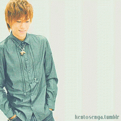 A Man With His Hands In His Pockets Stands In Front Of A White Background That Says Kentosenga.tumblr On It GIF
