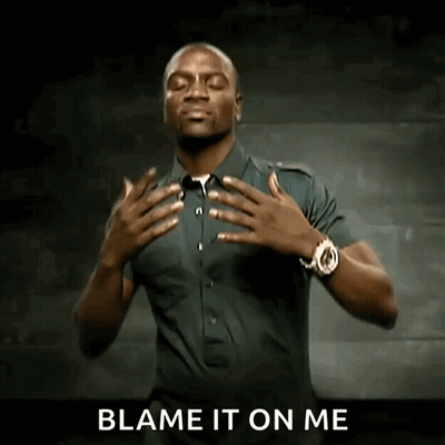 A Man With His Hands On His Chest And The Words Blame It On Me Behind Him GIF