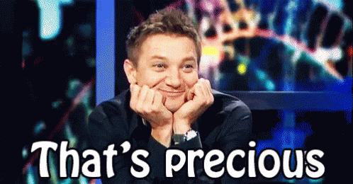 A Man With His Hands On His Face Is Smiling With The Words That 'S Precious Behind Him . GIF