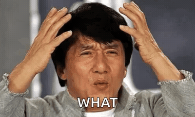 A Man With His Hands On His Head Is Making A Funny Face . GIF