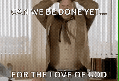 A Man With His Hands On His Head Is Standing In Front Of A Window . GIF