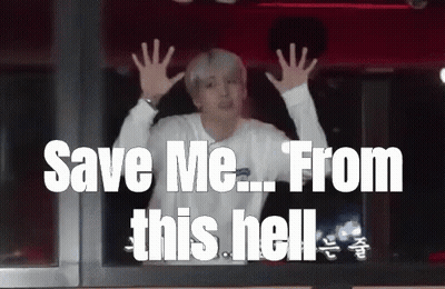 A Man With His Hands Up And The Words Save Me From This Hell Below Him GIF