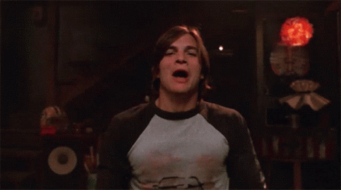 A Man With His Mouth Open And The Word Burn Written On His Shirt GIF