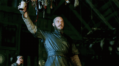 A Man With His Mouth Open Is Holding A Horn GIF