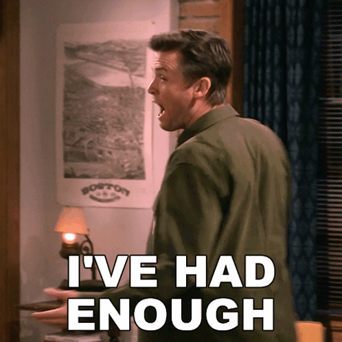 A Man With His Mouth Open Says I 'Ve Had Enough In Front Of A Boston Poster GIF
