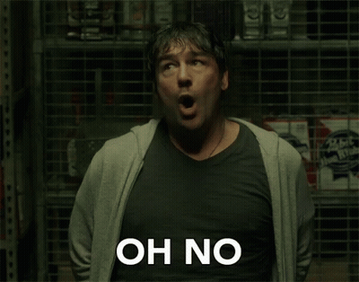 A Man With His Mouth Open Says Oh No In Front Of A Store Shelf GIF