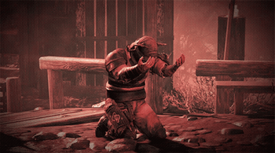 A Man With Horns On His Head Is Kneeling On The Ground GIF