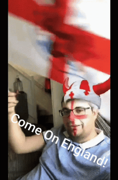 A Man With Horns Painted On His Face And The Words Come On England Written Below Him GIF