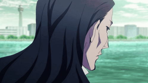 A Man With Long Black Hair Is Looking Out Over The Water GIF