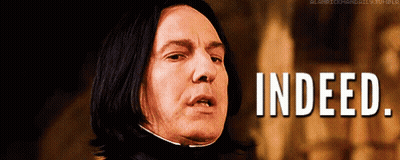 A Man With Long Black Hair Is Making A Face And The Words Indeed Are Above Him GIF