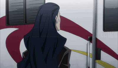A Man With Long Black Hair Is Standing In Front Of A Red And White Rv GIF