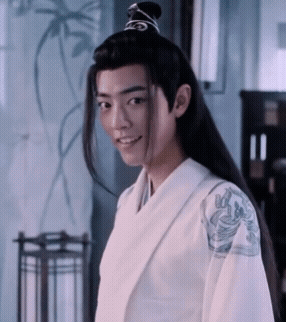 A Man With Long Black Hair Wearing A White Kimono GIF
