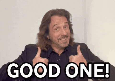 A Man With Long Hair And A Beard Giving A Thumbs Up With The Words Good One Behind Him GIF