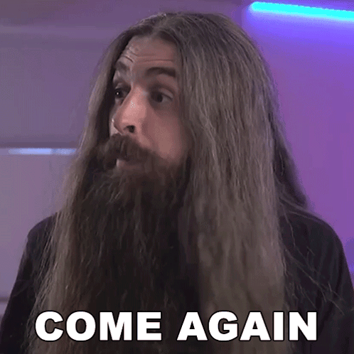 A Man With Long Hair And A Beard Has The Words Come Again On His Face GIF