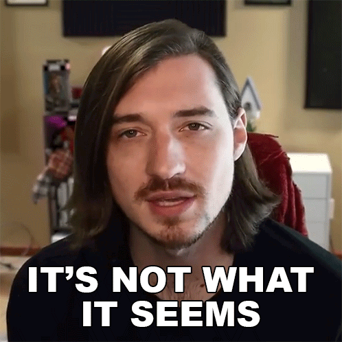 A Man With Long Hair And A Beard Has The Words " It 'S Not What It Seems " On His Face GIF