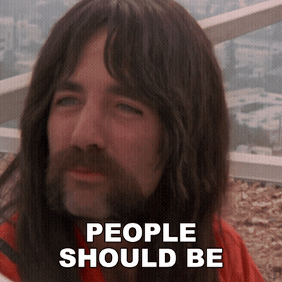 A Man With Long Hair And A Beard Has The Words People Should Be Written On His Face GIF