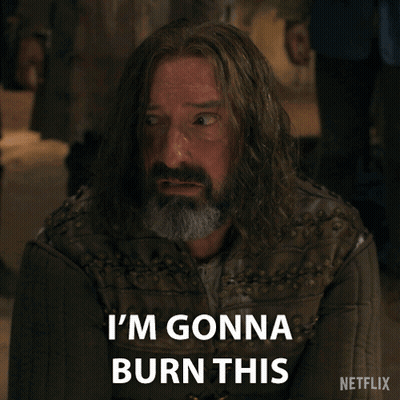 A Man With Long Hair And A Beard Has The Words Place To The Ground Written On His Face GIF