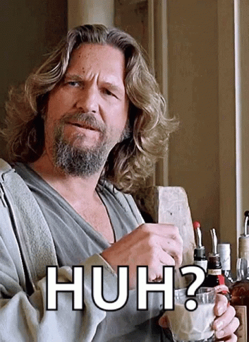 Man With Long Hair And Beard Holding Huh Glass GIF