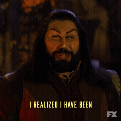 A Man With Long Hair And A Beard Is Saying " Completely Ruining My Life " GIF