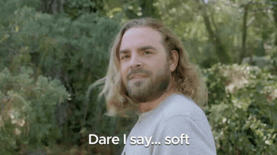 A Man With Long Hair And A Beard Is Saying `` Dare I Say ... Soft '' . GIF