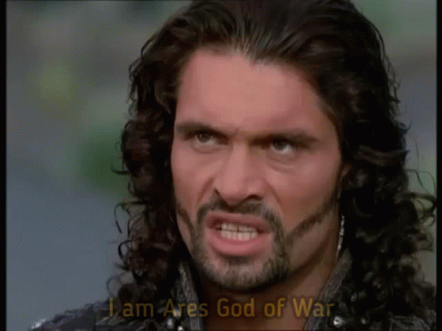 Man With Long Hair And Beard Saying I Am Ares God Of War GIF