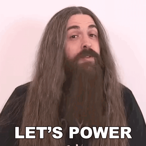 A Man With Long Hair And A Beard Is Saying `` Let 'S Power '' . GIF