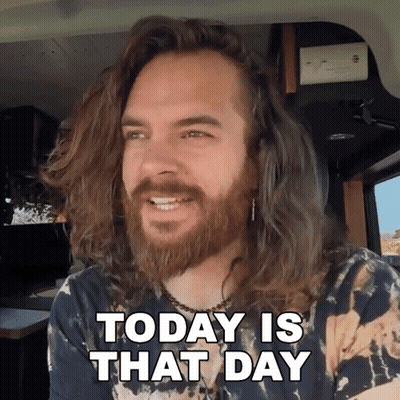 A Man With Long Hair And A Beard Is Sitting In A Car And Says Today Is That Day GIF