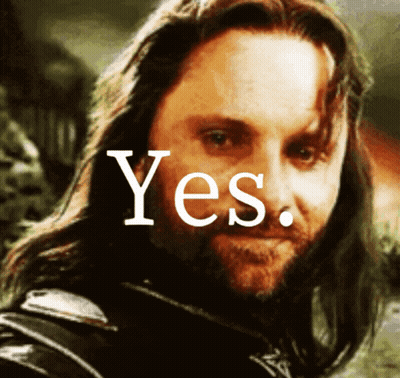 A Man With Long Hair And A Beard Is Smiling With The Word Yes Above Him GIF