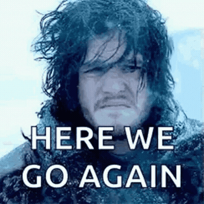 A Man With Long Hair And A Beard Is Standing In The Snow With The Words `` Here We Go Again '' On His Face . GIF