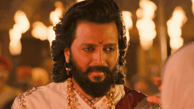 A Man With Long Hair And A Beard Is Wearing A White Shirt And A Red Scarf GIF