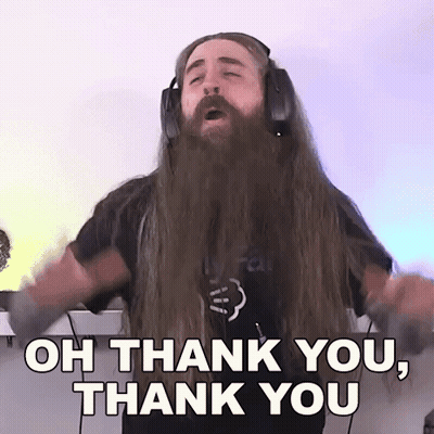 A Man With Long Hair And A Beard Is Wearing Headphones And Saying Oh Thank You Thank You . GIF