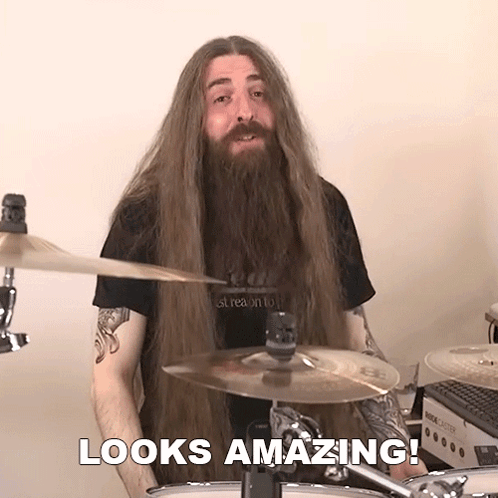 Man With Long Hair And Beard Playing Drums GIF