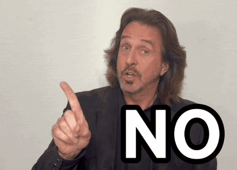 A Man With Long Hair And A Beard Pointing At The Word No GIF