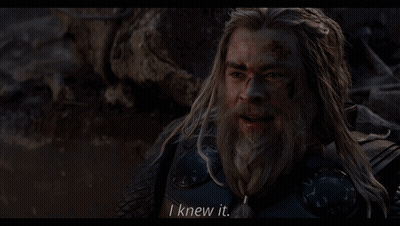 A Man With Long Hair And A Beard Says " I Knew It " In A Movie Scene GIF