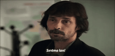 A Man With Long Hair And A Beard Says " Sirtma Lan " GIF