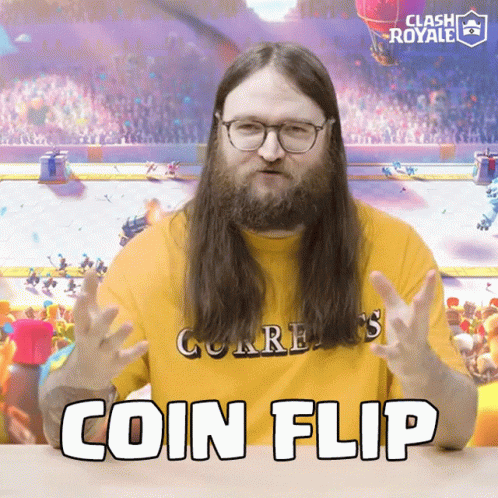 A Man With Long Hair And A Beard Wearing A Yellow Shirt That Says Coin Flip GIF